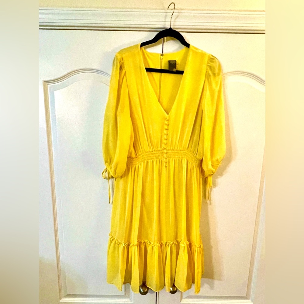 Shine in a golden rod dress by Taylor, size 16